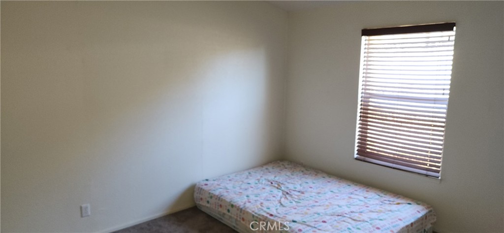 238 Elams Ranch Road Oroville, CA 95966 - Photo 39 of 75 a bedroom with a bed and a window