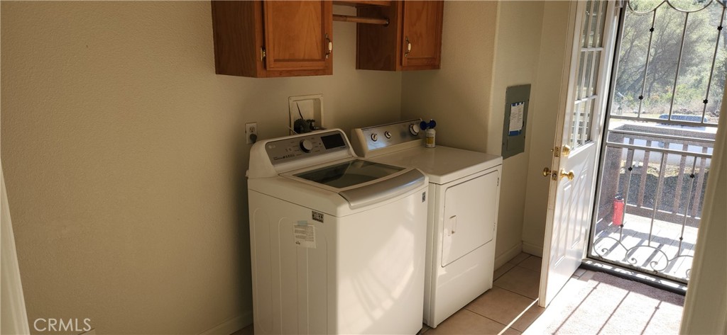 238 Elams Ranch Road Oroville, CA 95966 - Photo 42 of 75 a bathroom with a granite countertop sink and a mirror