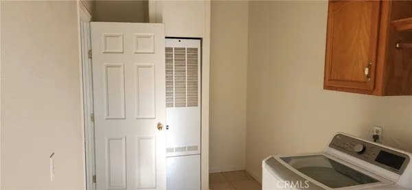 a pathway of a yard and an trees