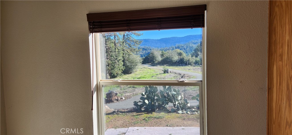 238 Elams Ranch Road Oroville, CA 95966 - Photo 45 of 75 a view of a glass door and a window