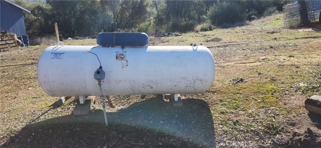 238 Elams Ranch Road Oroville, CA 95966 - Photo 49 of 75 a wooden bench sitting in the middle of a yard