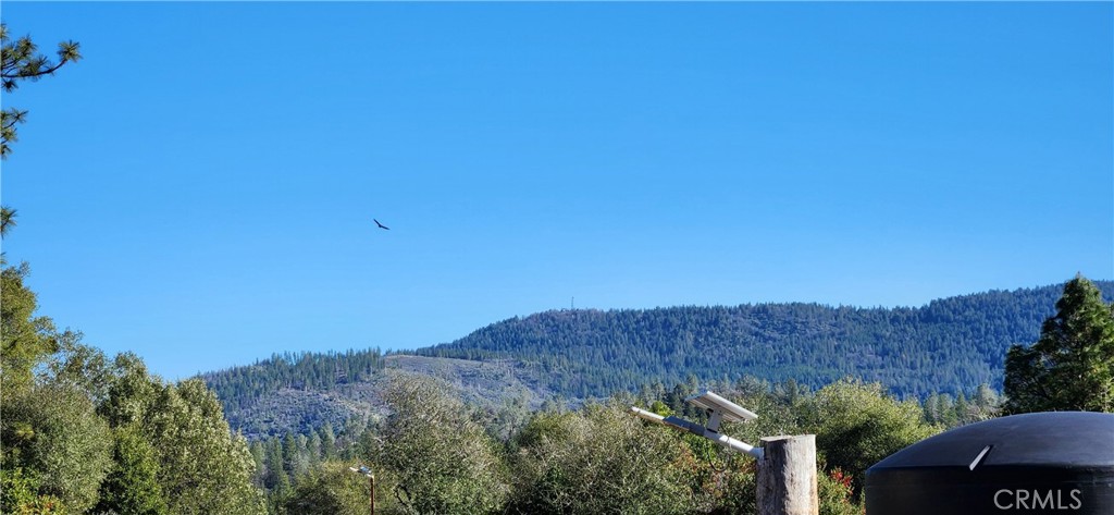 238 Elams Ranch Road Oroville, CA 95966 - Photo 68 of 75 a view of a lake with a mountain in the background
