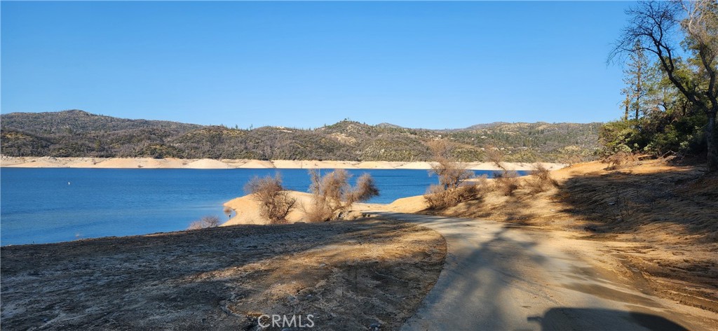 238 Elams Ranch Road Oroville, CA 95966 - Photo 72 of 75 a view of a lake with mountain in the background