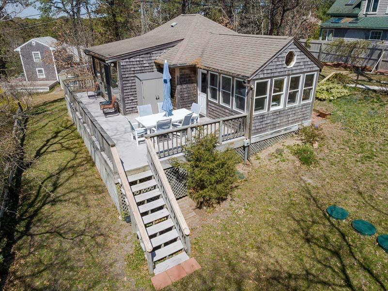 48 Nauhaught Bluff Road Wellfleet, MA 02667 - Photo 1 of 31 Back view of house with stairs to yard