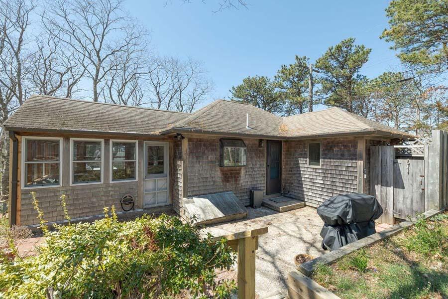48 Nauhaught Bluff Road Wellfleet, MA 02667 - Photo 2 of 31 Front patio and outdoor shower