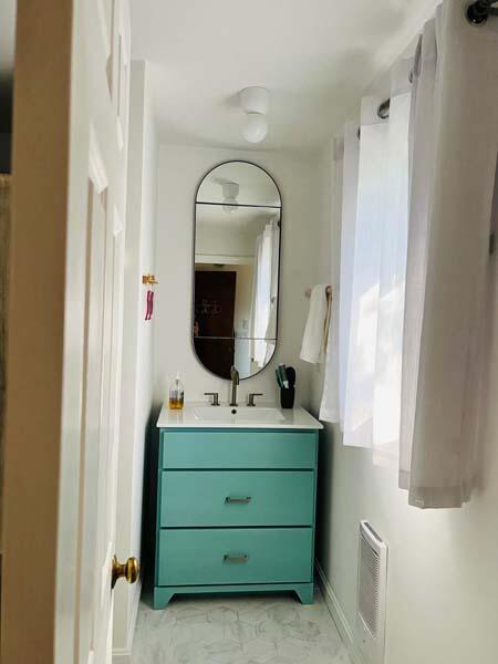 48 Nauhaught Bluff Road Wellfleet, MA 02667 - Photo 21 of 31 Bathroom vanity and mirror