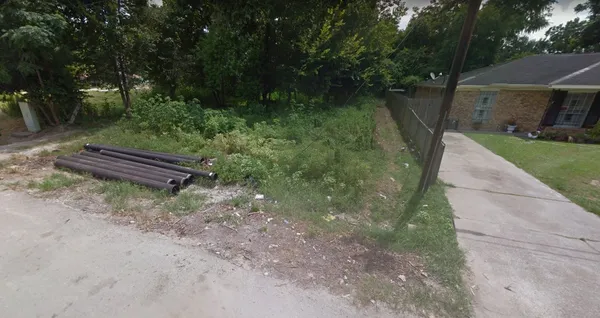 a garden view with a seating space