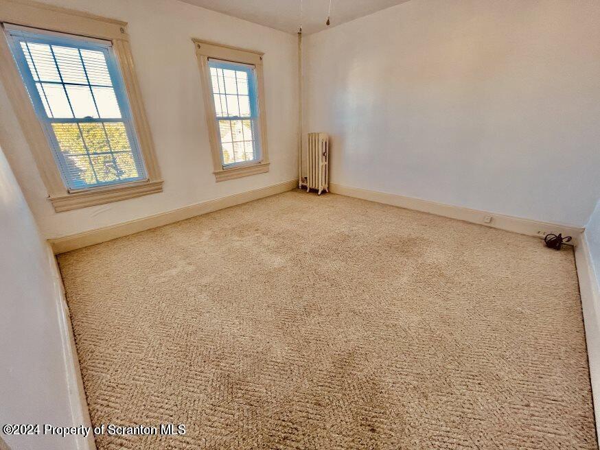 1630 Myrtle Street, Unit 2 Scranton, PA 18510 - Photo 10 of 17 an empty room with windows