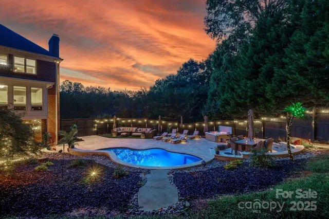 a view of a swimming pool with a patio