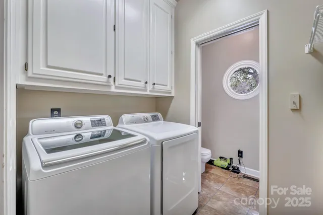 a spacious bedroom with a bed and a couch