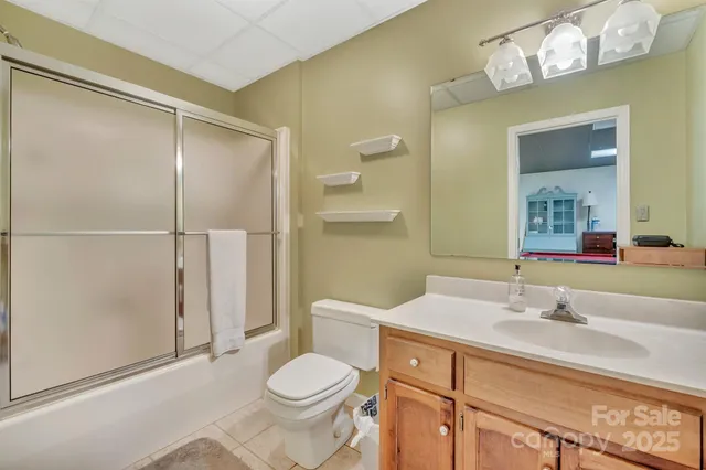 a view of a house with backyard porch and sitting area