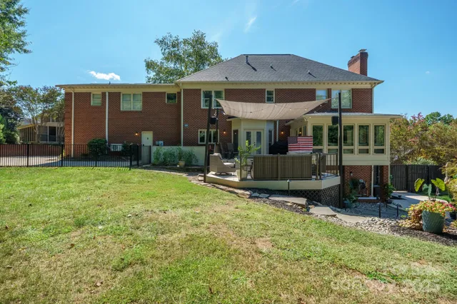 a view of a patio with couches chairs and a table
