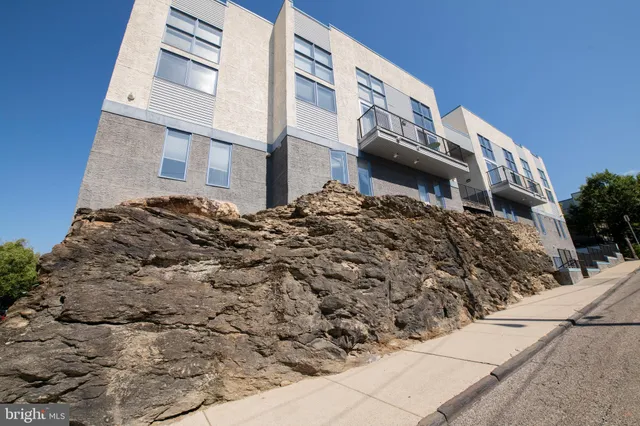 a cars parked on the side of a street