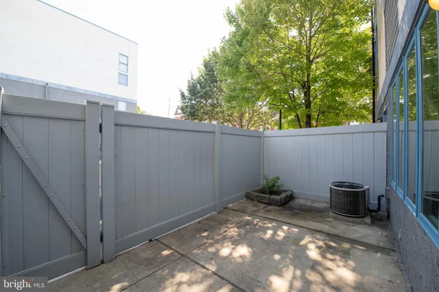 a view of a kitchen with a sink