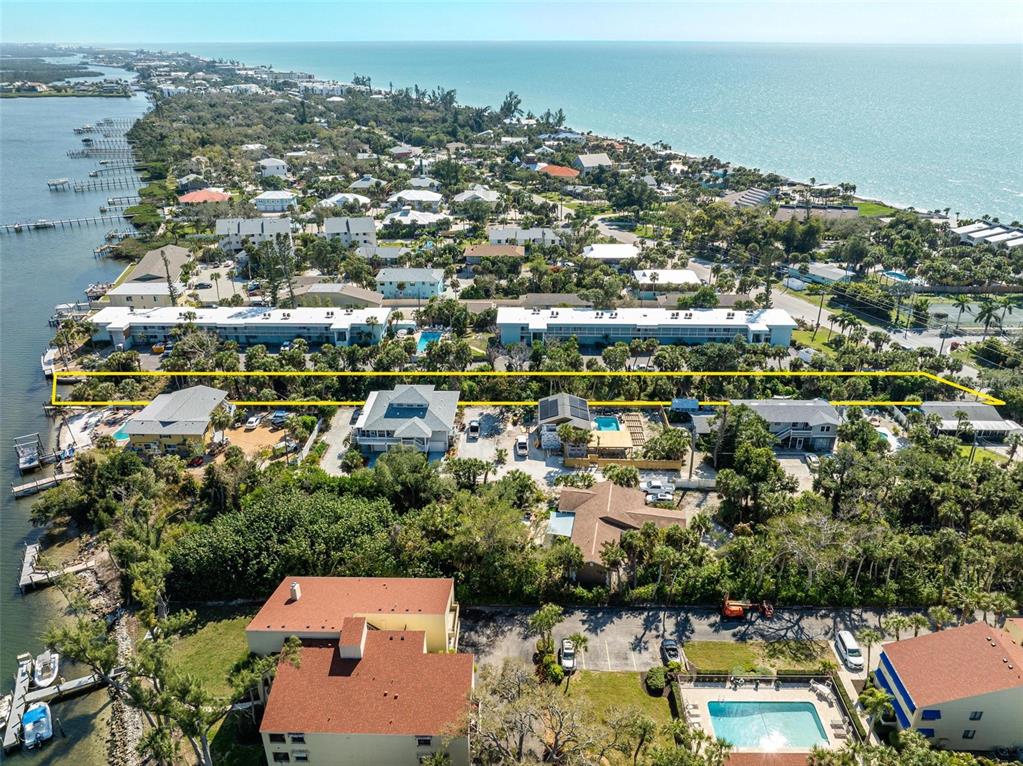 5065 North Beach Road Englewood, FL 34223 - Photo 13 of 22 an aerial view of a city with lots of residential buildings