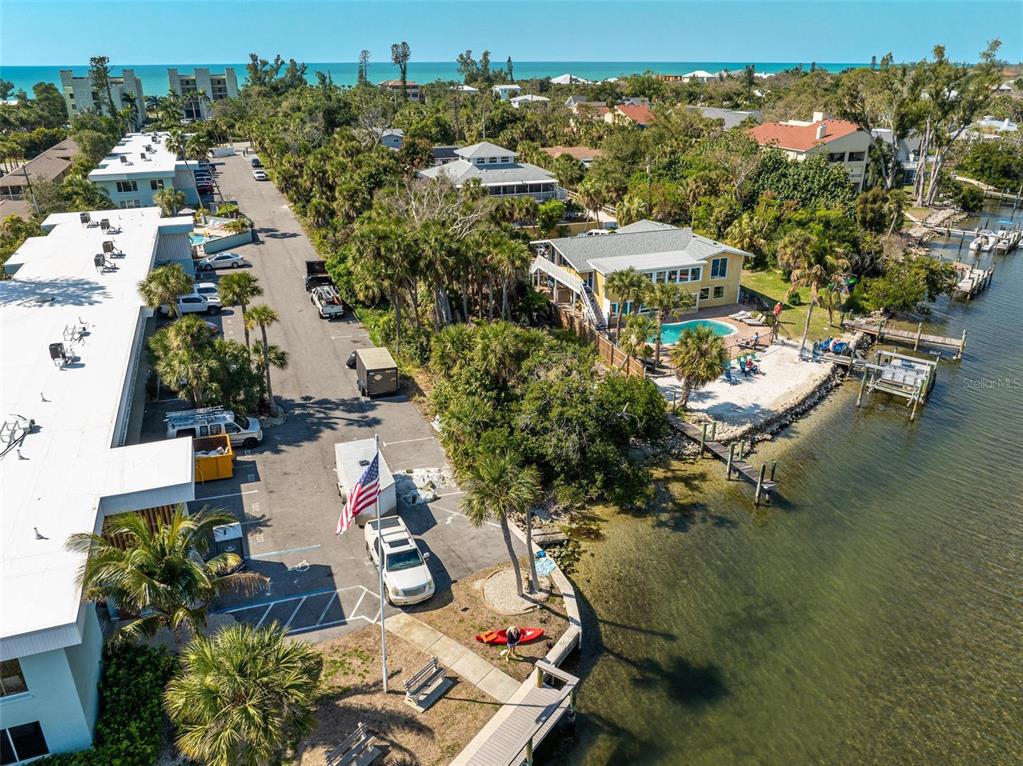 5065 North Beach Road Englewood, FL 34223 - Photo 16 of 22 an aerial view of a house with a lake view