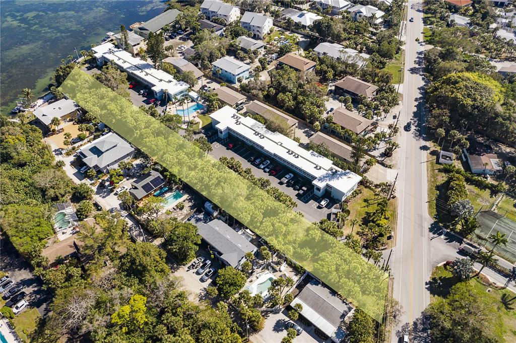 5065 North Beach Road Englewood, FL 34223 - Photo 19 of 22 an aerial view of a residential houses with outdoor space