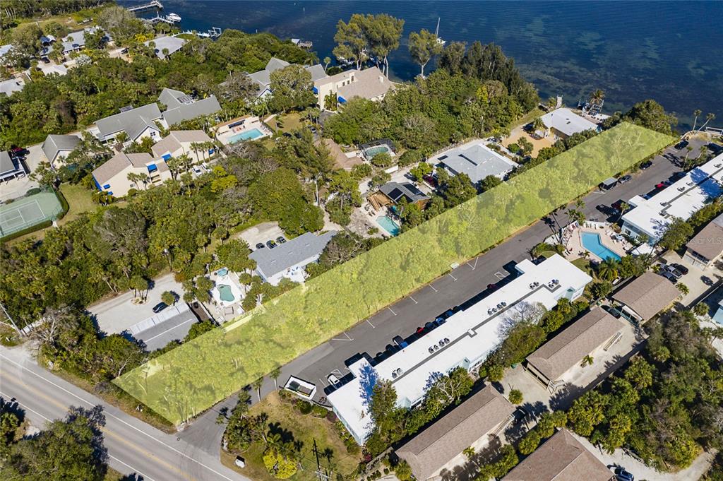 5065 North Beach Road Englewood, FL 34223 - Photo 20 of 22 an aerial view of a residential houses with outdoor space