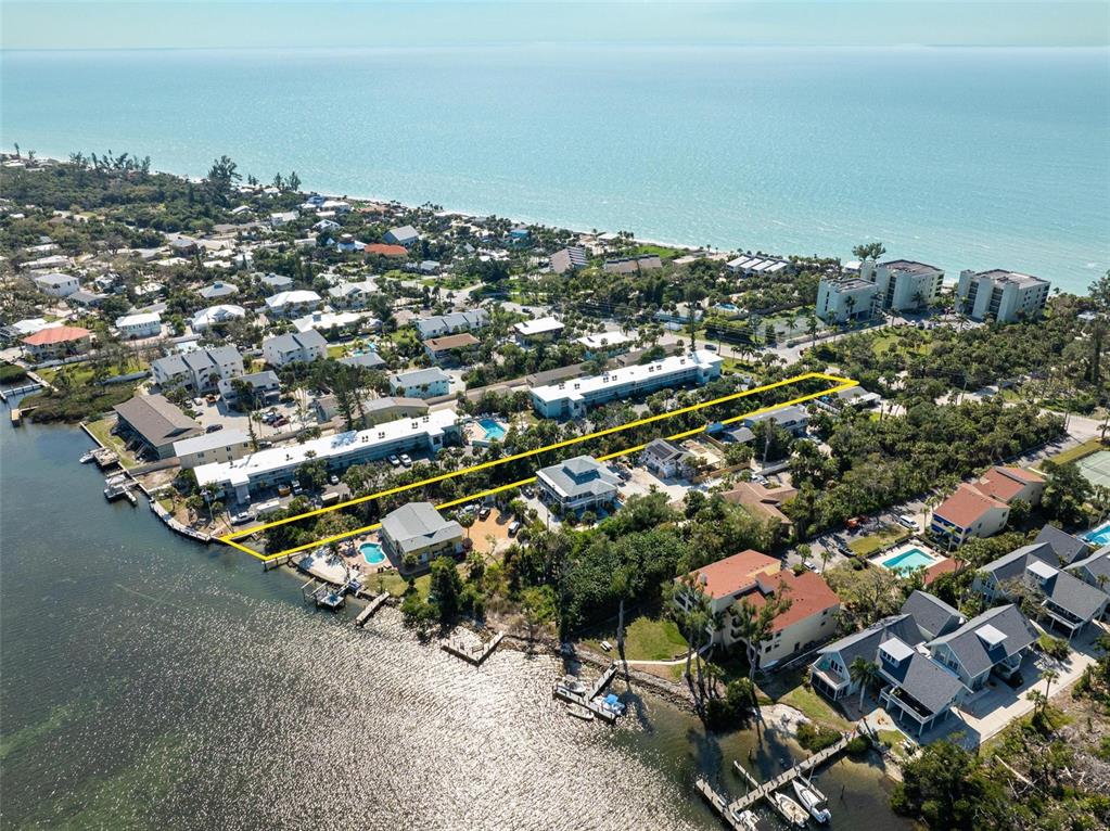 5065 North Beach Road Englewood, FL 34223 - Photo 9 of 22 an aerial view of multiple house