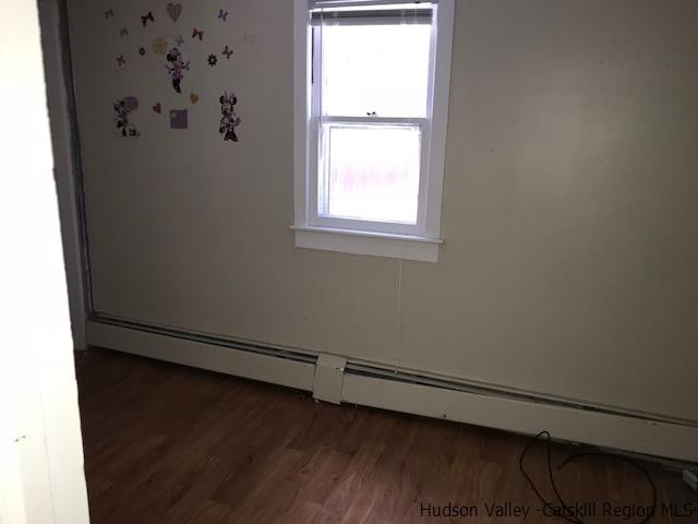 202 Rutsonville Road Wallkill, NY 12589 - Photo 4 of 10 a view of a small space with wooden floor a window