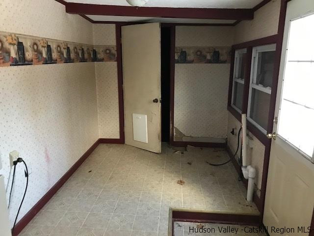202 Rutsonville Road Wallkill, NY 12589 - Photo 8 of 10 a view of a room with rack on the wall