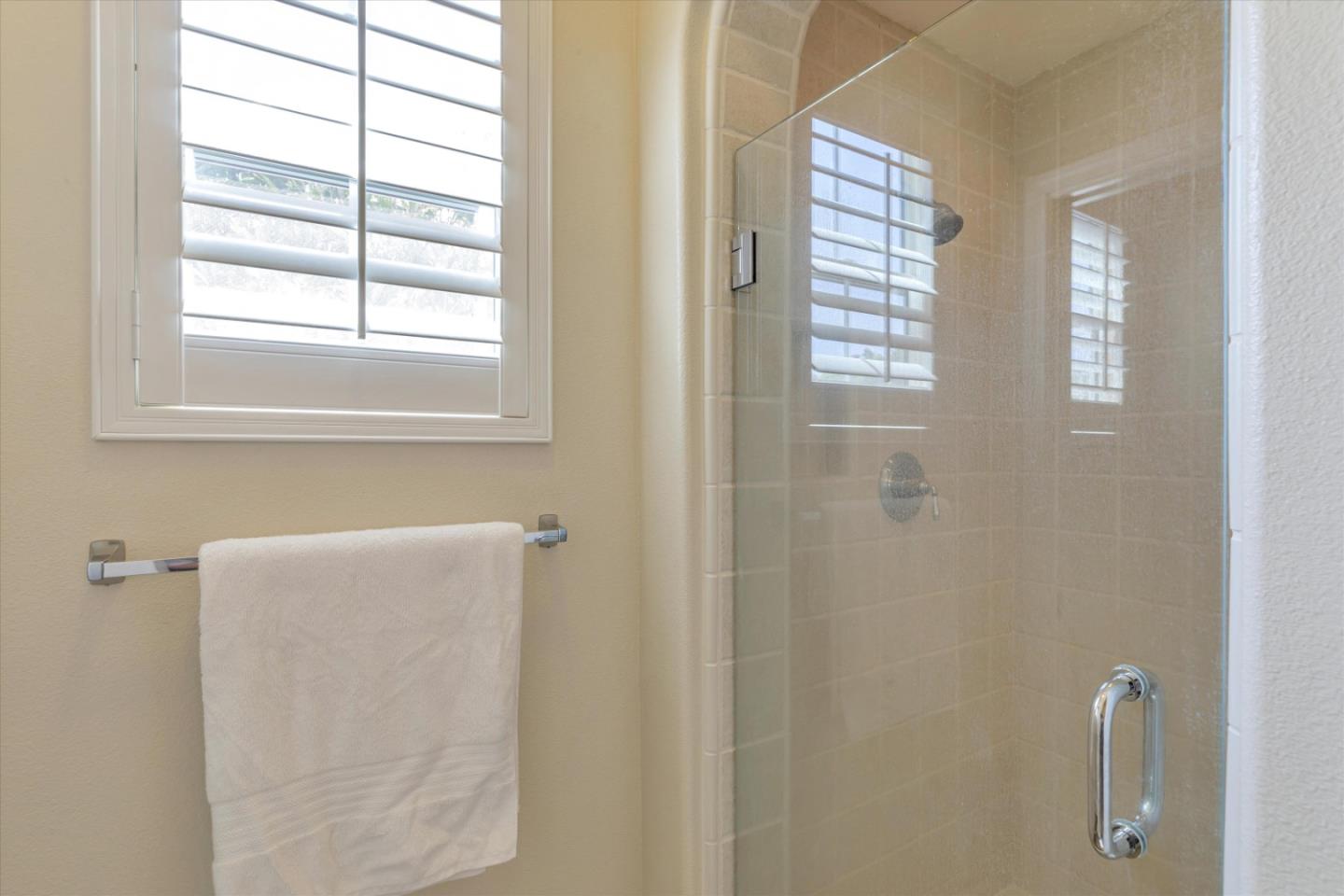 2124 Harvest Moon Lane San Ramon, CA 94582 - Photo 15 of 31 a bathroom with a window a sink and a shower