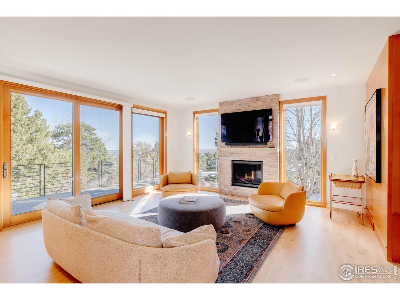 835 Circle Drive Boulder, CO 80302 - Photo 12 of 35 Family Room with fireplace and views