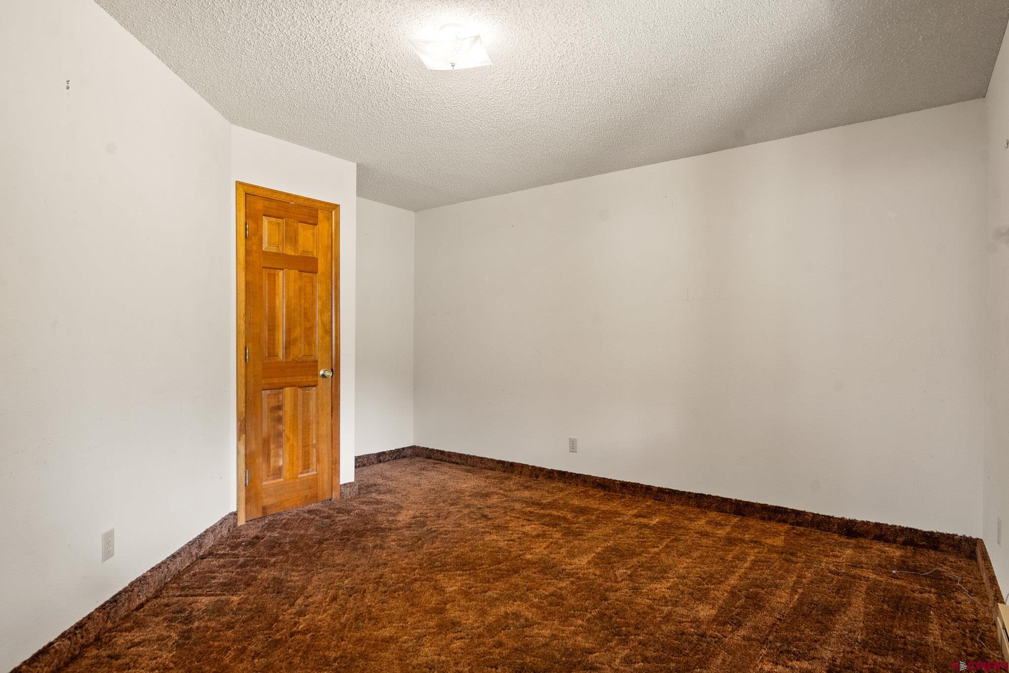 21565 Highway 65 Cedaredge, CO 81413 - Photo 27 of 42 a view of empty room