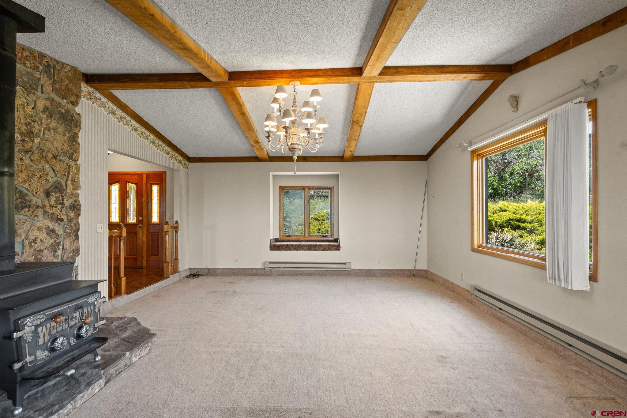 21565 Highway 65 Cedaredge, CO 81413 - Photo 4 of 42 a view of an empty room with a window