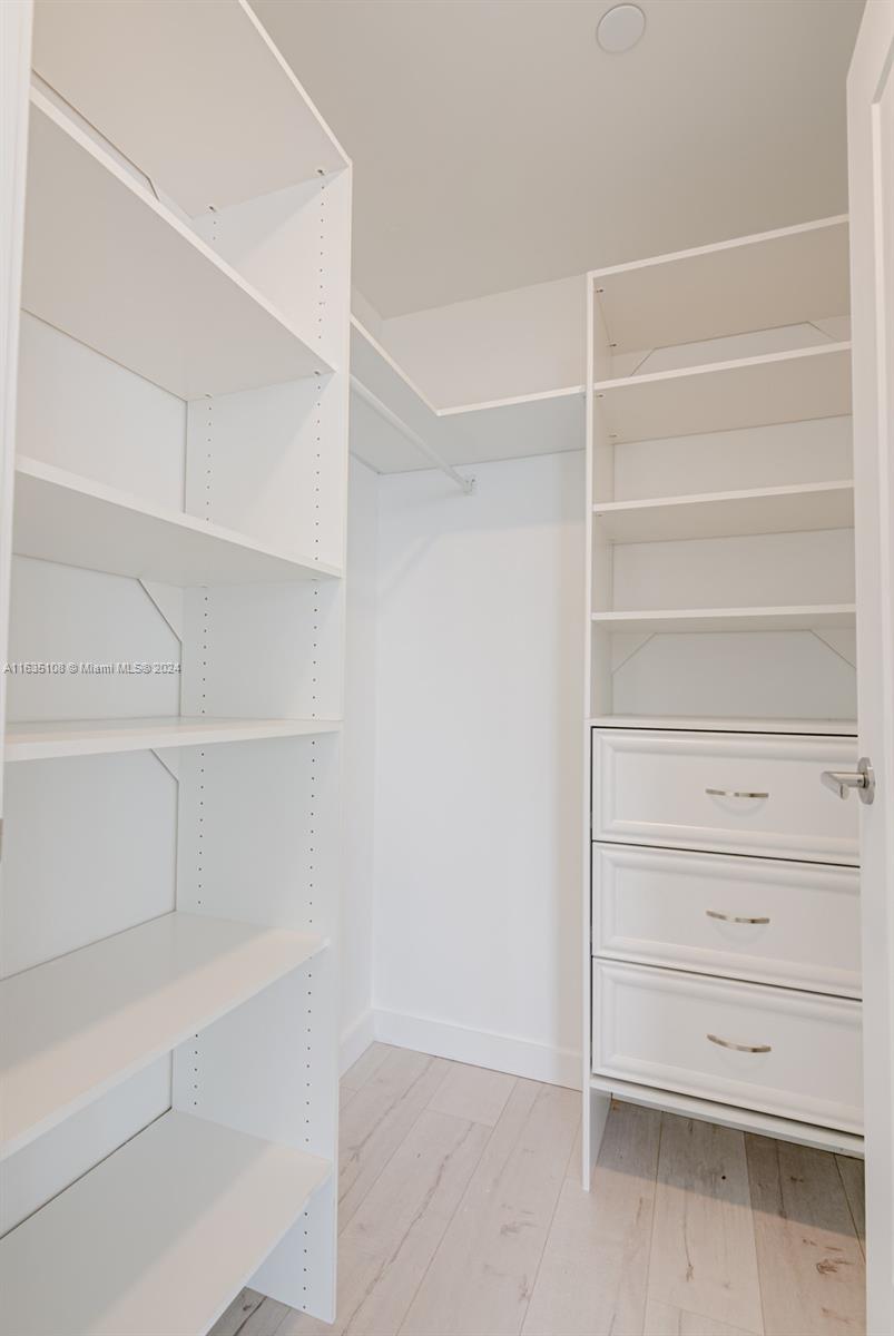 601 Northeast 27th Street, Unit 1502 Miami, FL 33137 - Photo 15 of 61 a view of an empty walk in closet