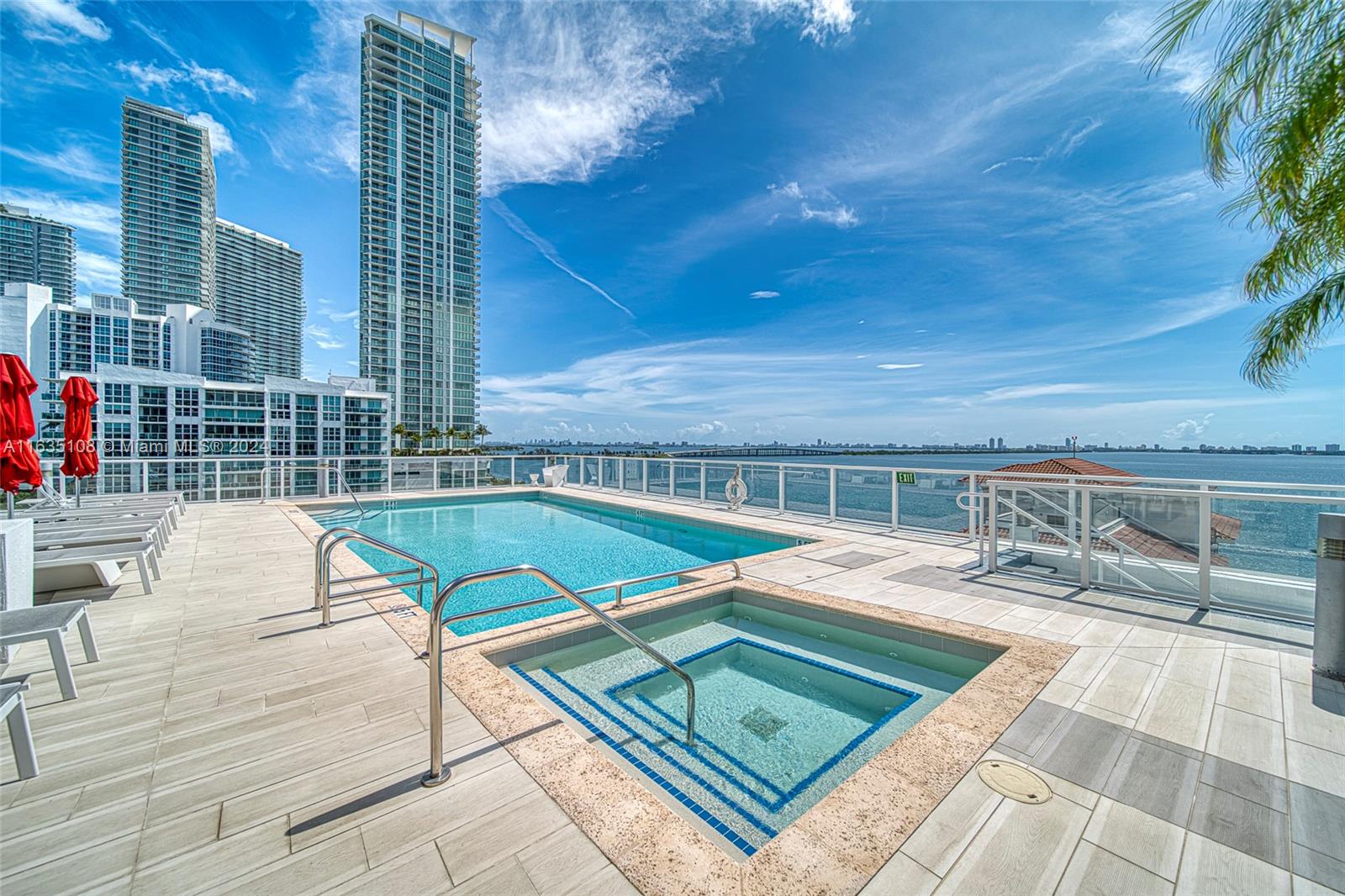 601 Northeast 27th Street, Unit 1502 Miami, FL 33137 - Photo 40 of 61 a view of a patio with a table and chairs