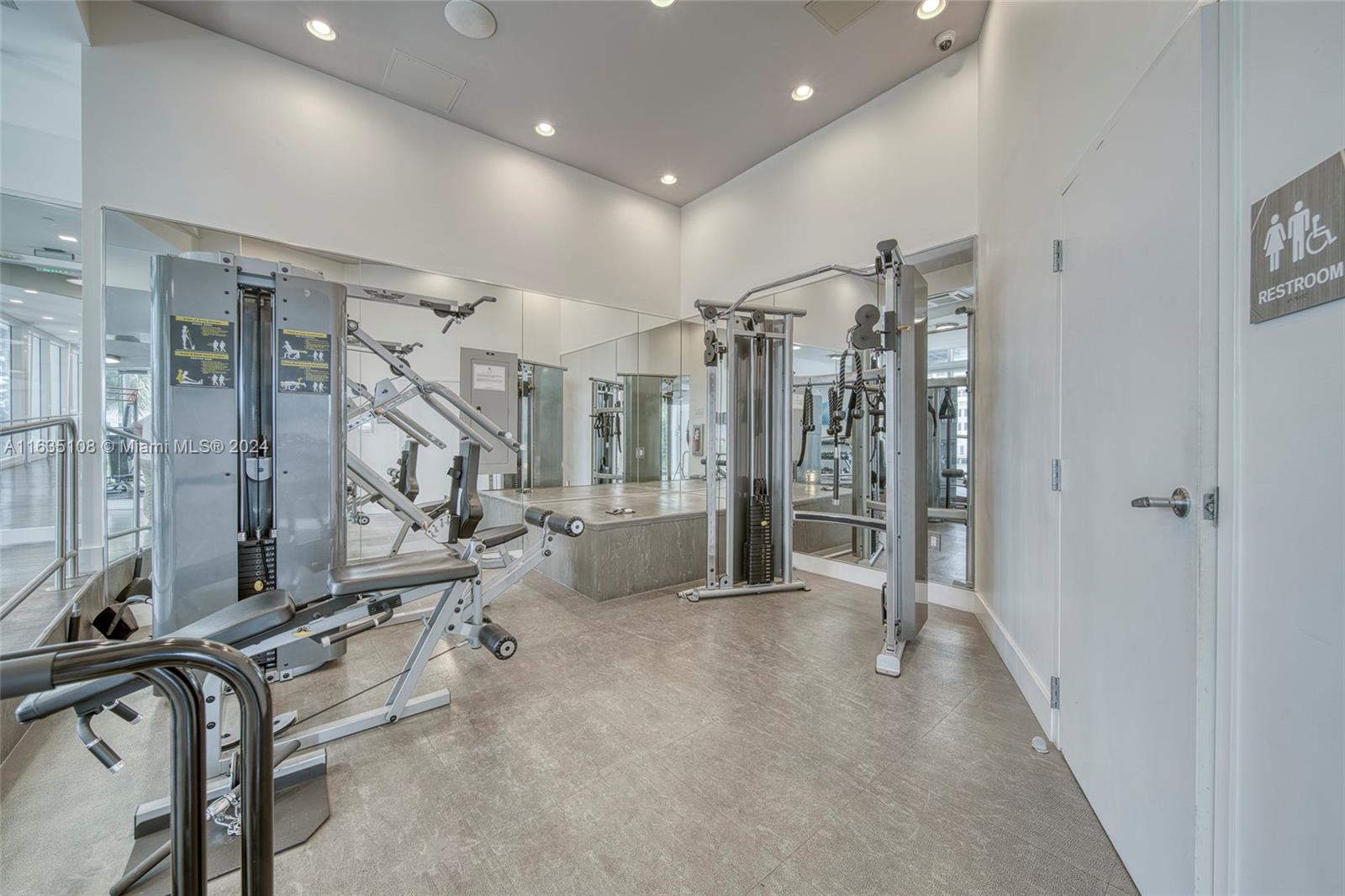 601 Northeast 27th Street, Unit 1502 Miami, FL 33137 - Photo 45 of 61 a view of a room with gym equipment