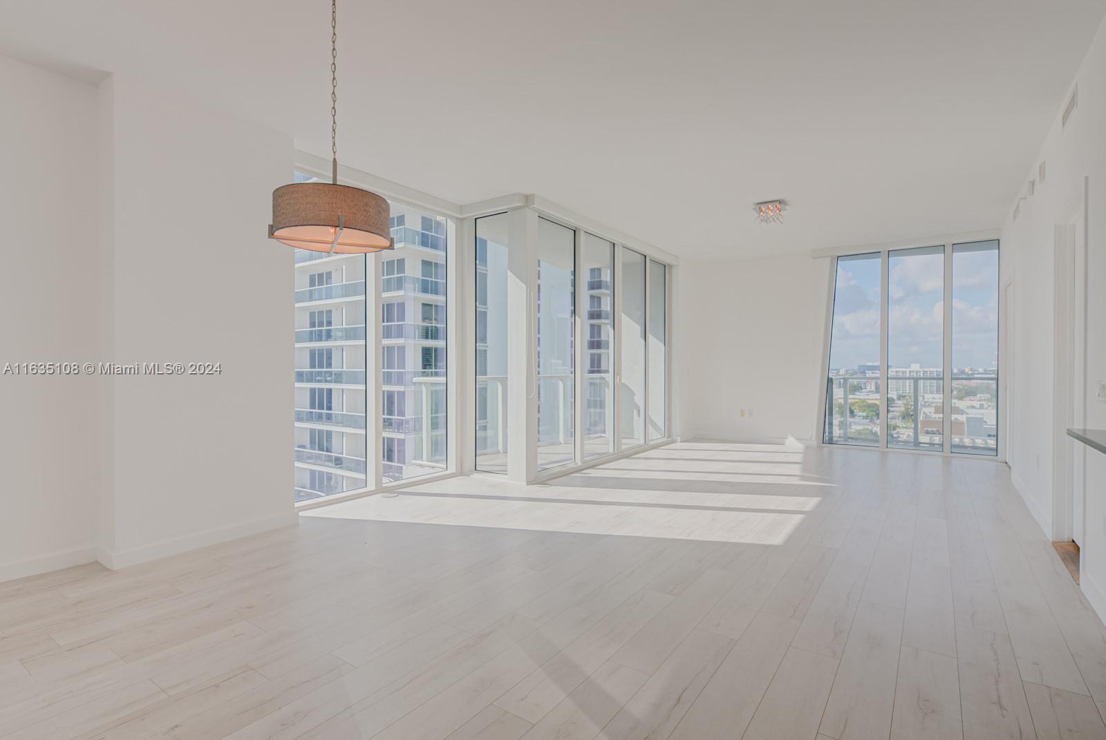 601 Northeast 27th Street, Unit 1502 Miami, FL 33137 - Photo 9 of 61 a view of an empty room with a window