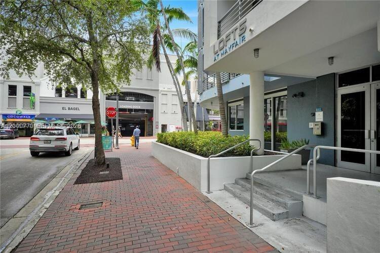 3339 Virginia Street, Unit 339 Miami, FL 33133 - Photo 24 of 24 a view of a building with car parked