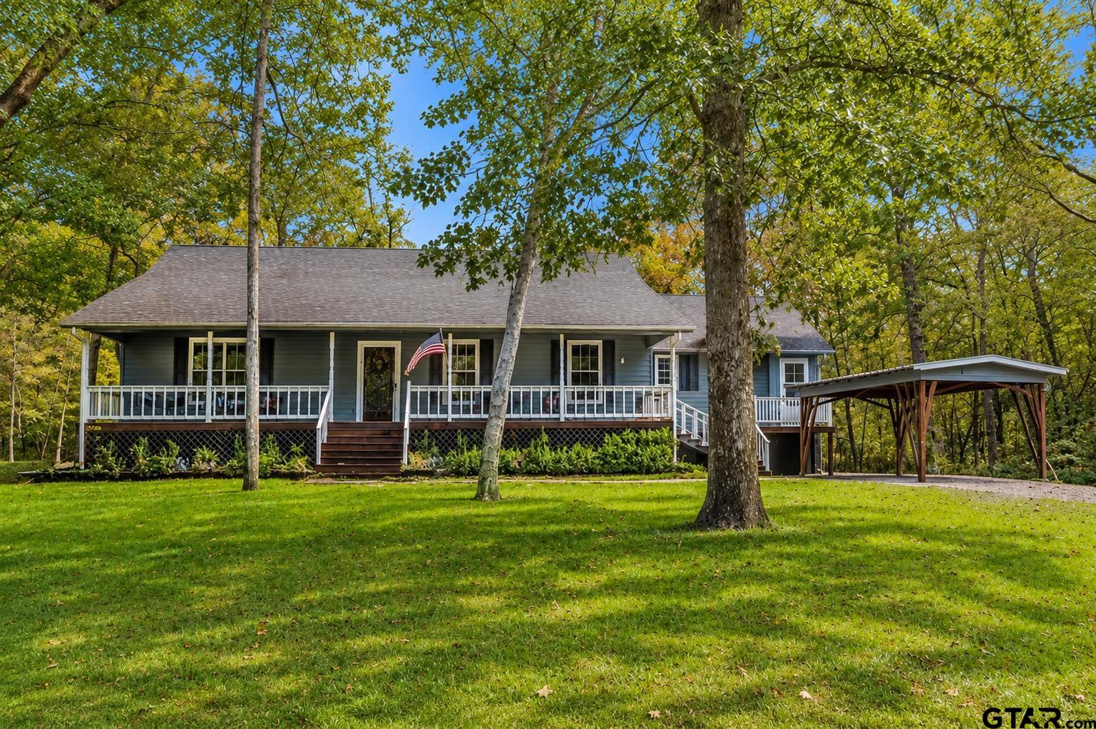 109 King Lyle Road Scroggins, TX 75480 - Photo 1 of 48 a front view of a house with a yard