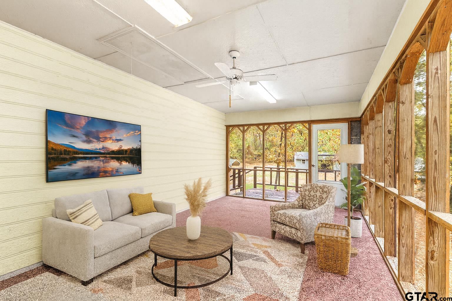 109 King Lyle Road Scroggins, TX 75480 - Photo 29 of 48 a living room with furniture and a large window