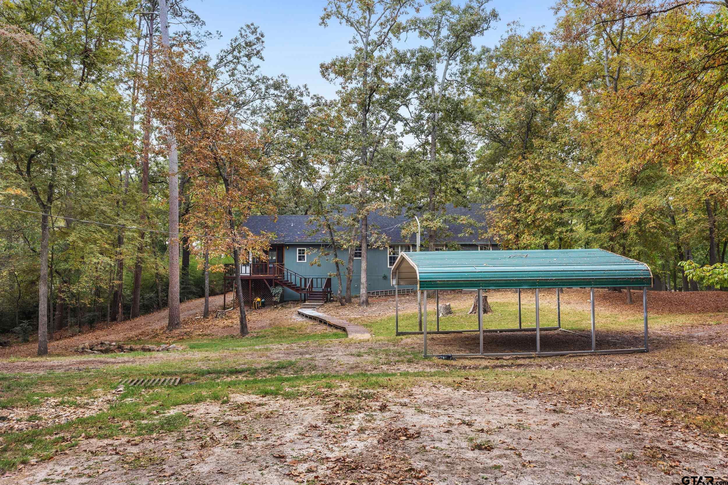 109 King Lyle Road Scroggins, TX 75480 - Photo 35 of 48 a view of a house with a backyard