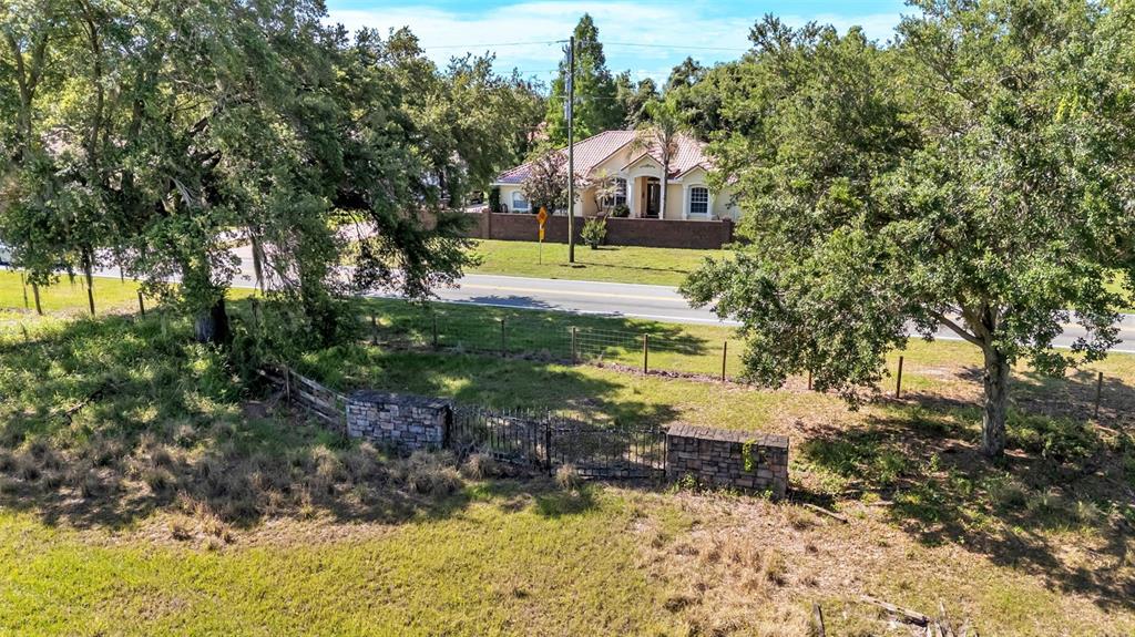 Country Club Road South Winter Haven, FL 33881 - Photo 6 of 6 a view of a house with a yard
