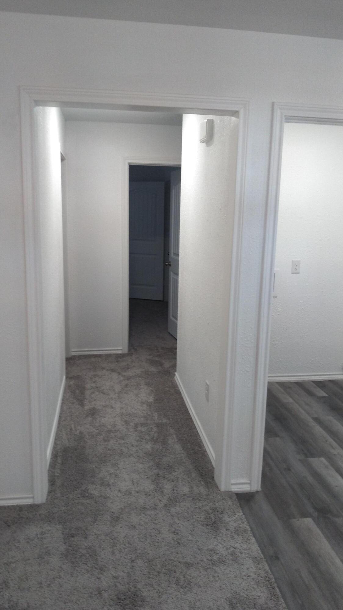 1101 14th Street Lubbock, TX 79401 - Photo 17 of 19 an empty room and closet area