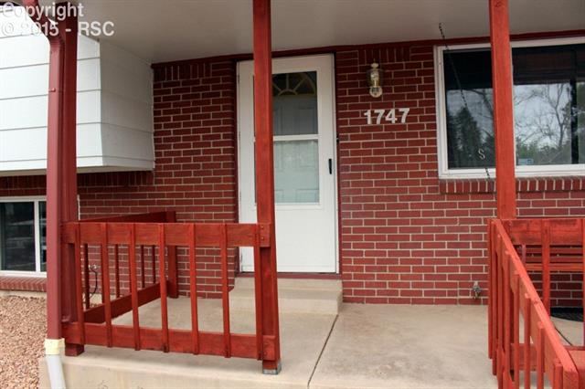 1747 Van Diest Road Colorado Springs, CO 80915 - Photo 4 of 30 Covered front porch greets your guests!