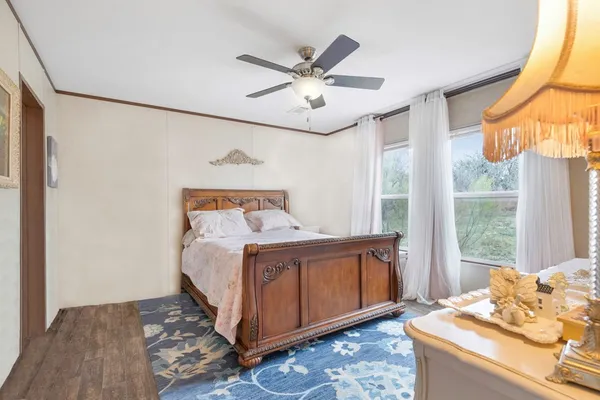 a bed room with a bed and a window