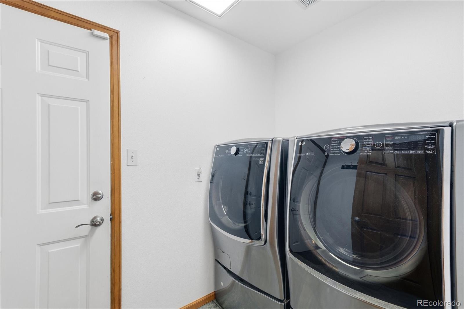 2565 Nova Road Pine, CO 80470 - Photo 15 of 50 a utility room with dryer and washer