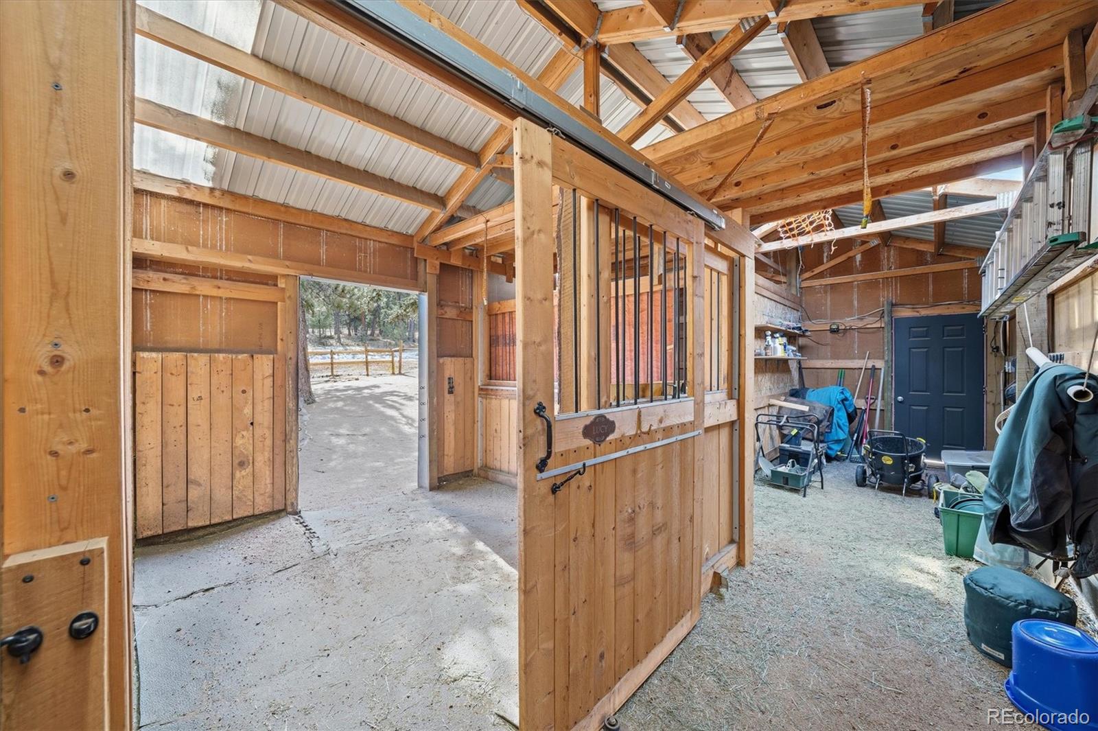 2565 Nova Road Pine, CO 80470 - Photo 40 of 50 a view of a storage room with an empty room
