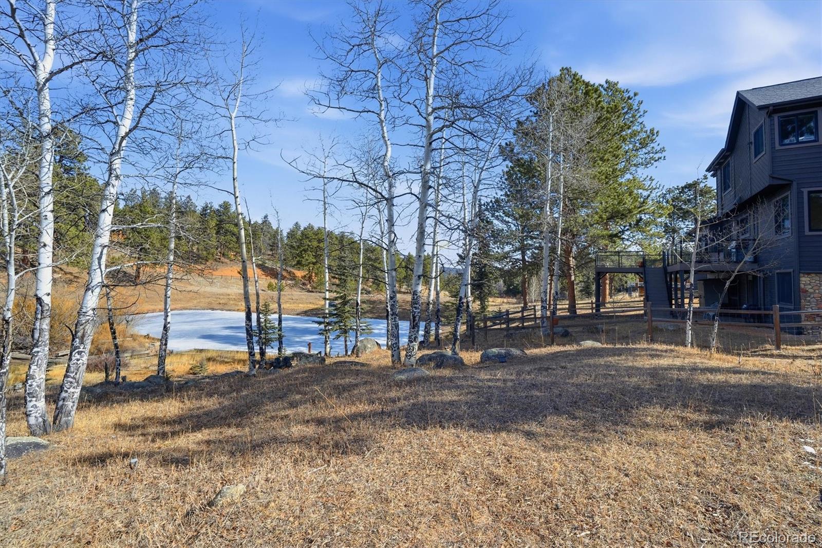 2565 Nova Road Pine, CO 80470 - Photo 43 of 50 a view of a road with a building in the background