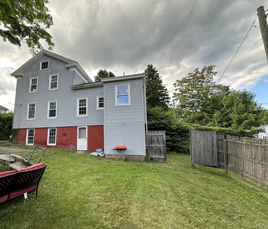 487 Main Street Amherst, MA 01002 - Photo 36 of 39 a front view of house with yard and seating area