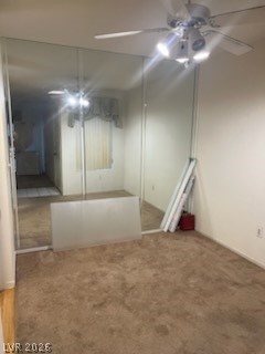 8070 West Russell Road, Unit 1057 Las Vegas, NV 89113 - Photo 8 of 10 Mirrored closet doors expand the perception of space in this room, complemented by a convenient ceiling fan for comfort.