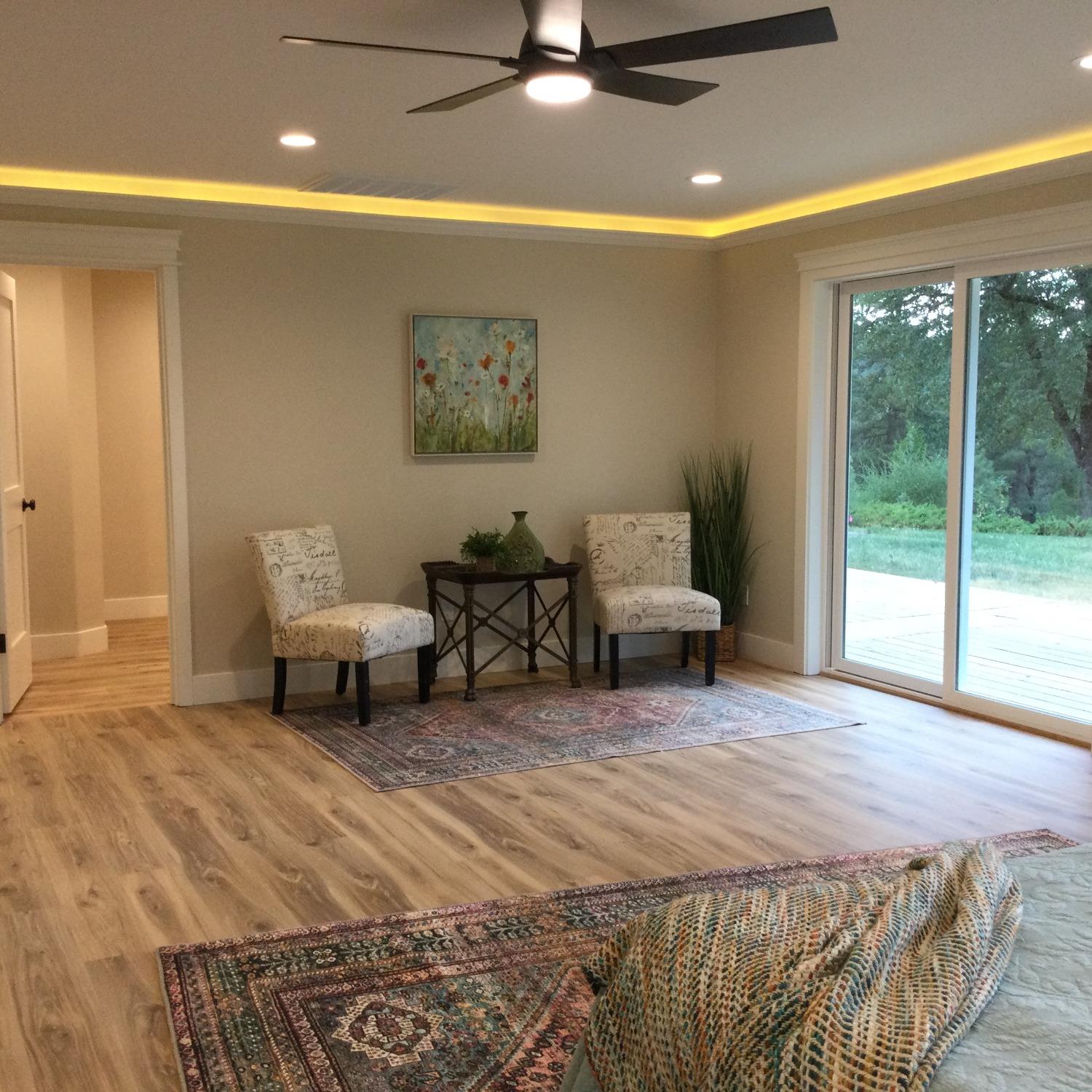 5110 Sly Park Road Pollock Pines, CA 95726 - Photo 17 of 86 a bedroom with a bed and a large window