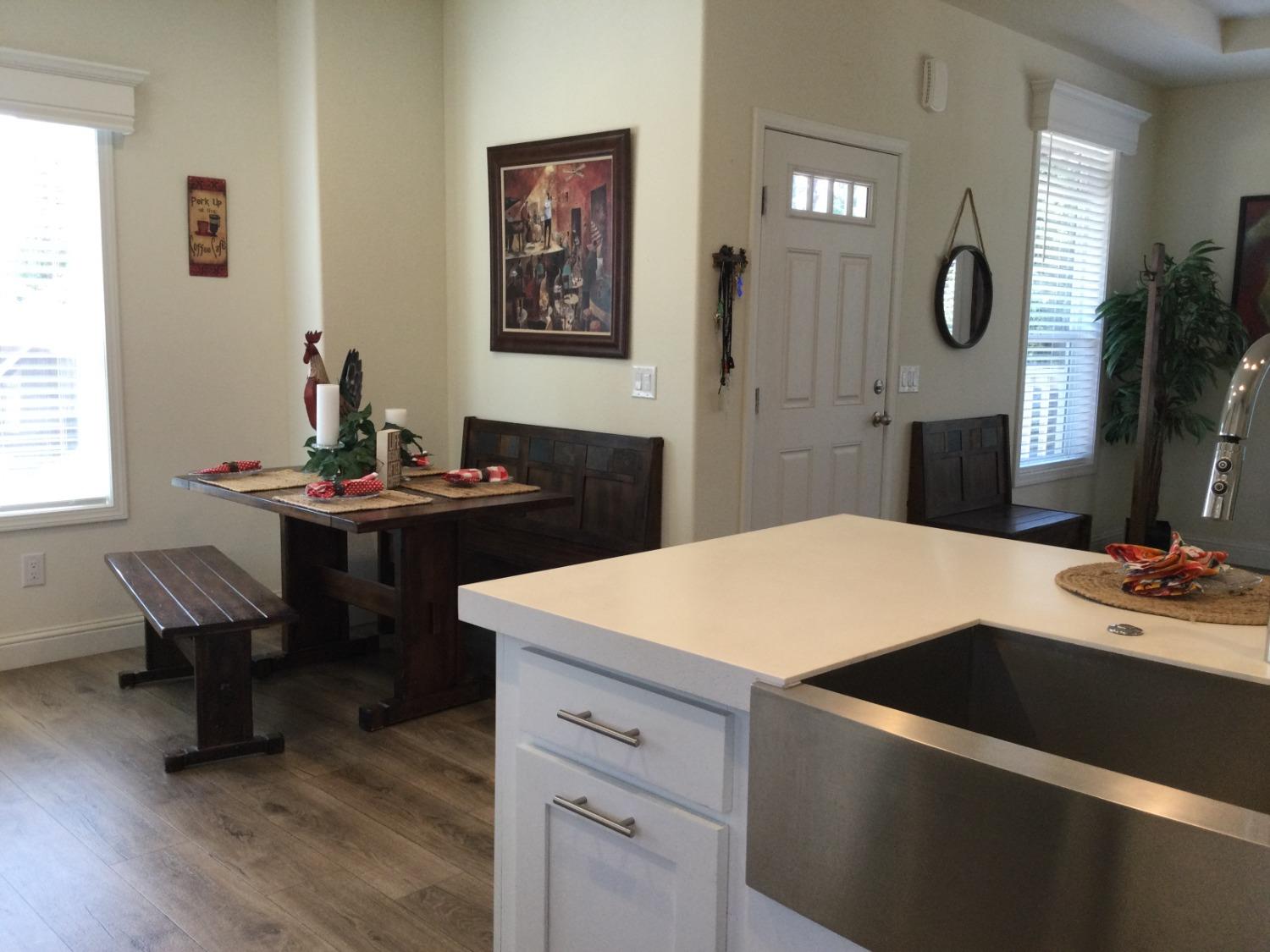 5110 Sly Park Road Pollock Pines, CA 95726 - Photo 70 of 86 a room with a table chairs and a dresser