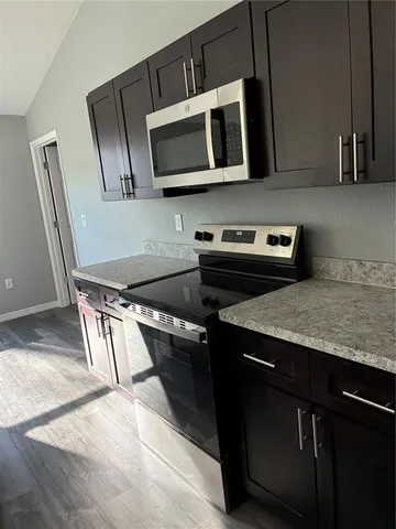 a view of a room with a fan