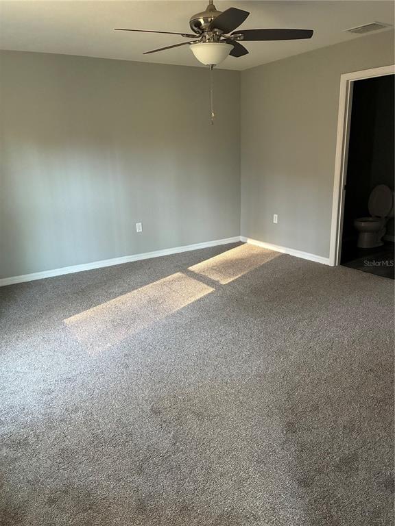 13033 Southwest 82nd Ave Road Ocala, FL 34473 - Photo 14 of 27 a view of a room with a fan